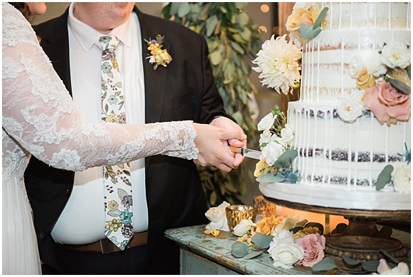 Newport Beach, CA Wedding | Eleagant Wedding Cake | Bride & Groom Cut the Cake | Photography by destination wedding photographer Brooke Bakken | www.brookebakken.com
