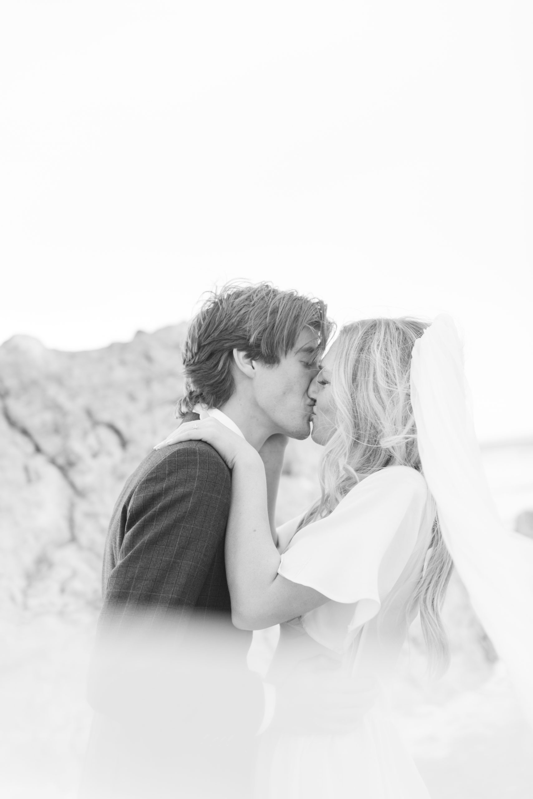 veil shot of a black and white engagement session at Interlope Island