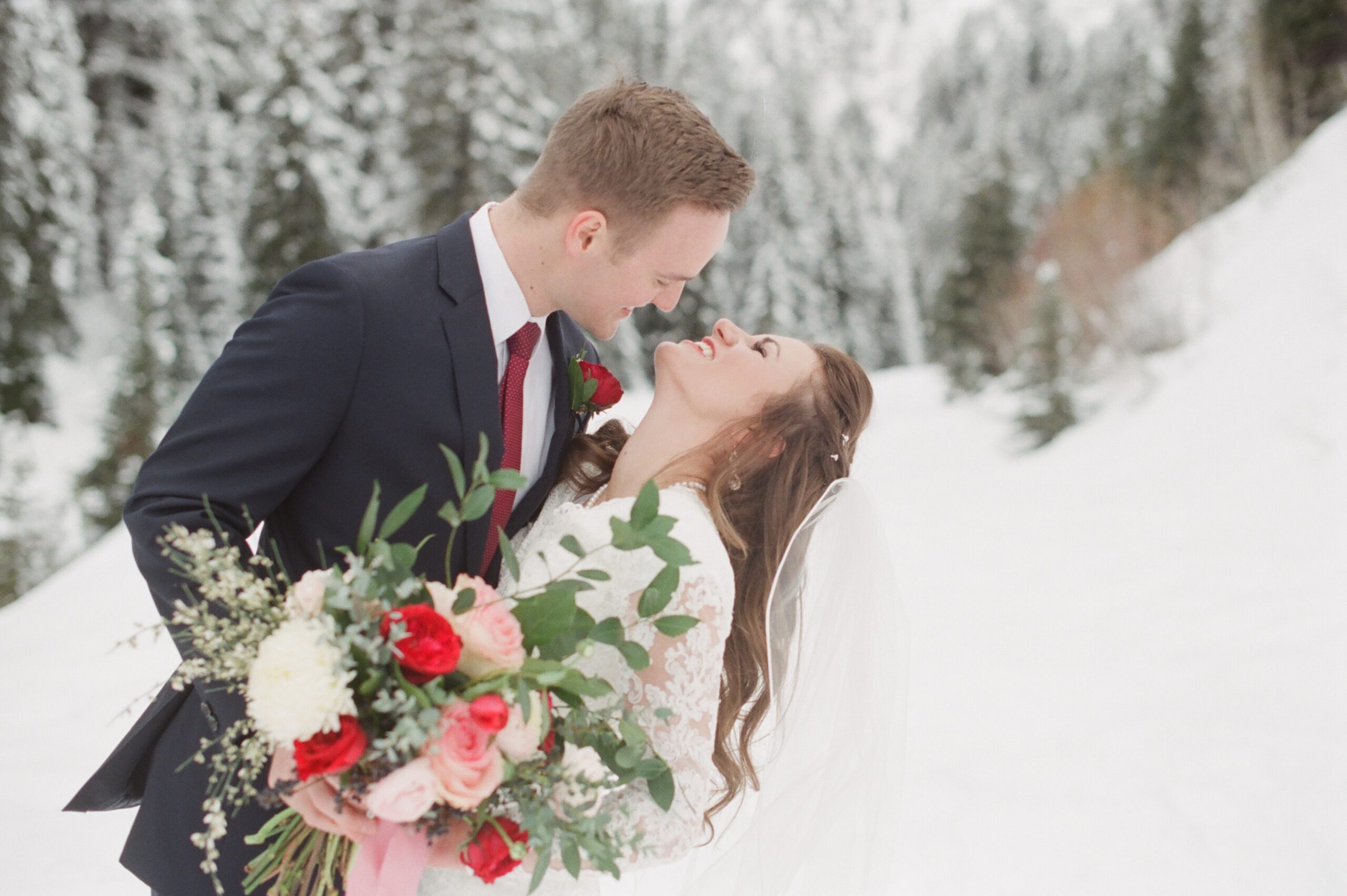 Utah winter photographer tips for bridals in the snow -- candid laughter