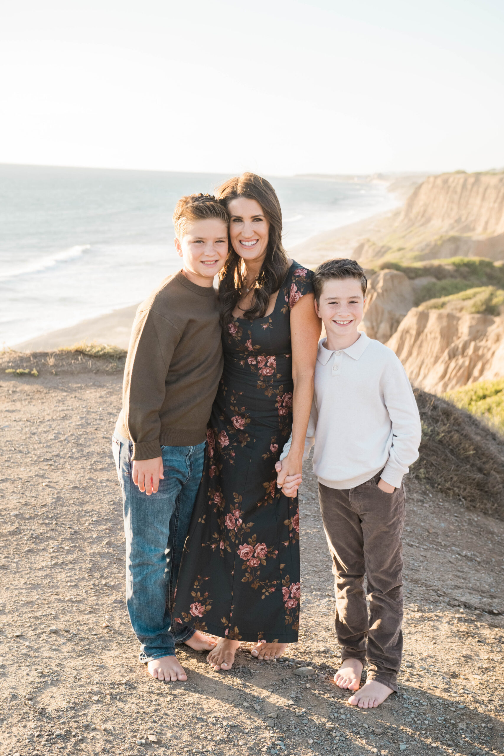 Mother and Son barefoot on the beach during golden hour, Southern California family photography